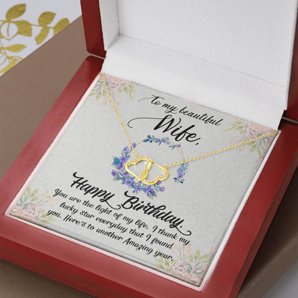 Solid Gold For Your One And Only. Yellow Gold Interlocking Hearts With Real Diamonds